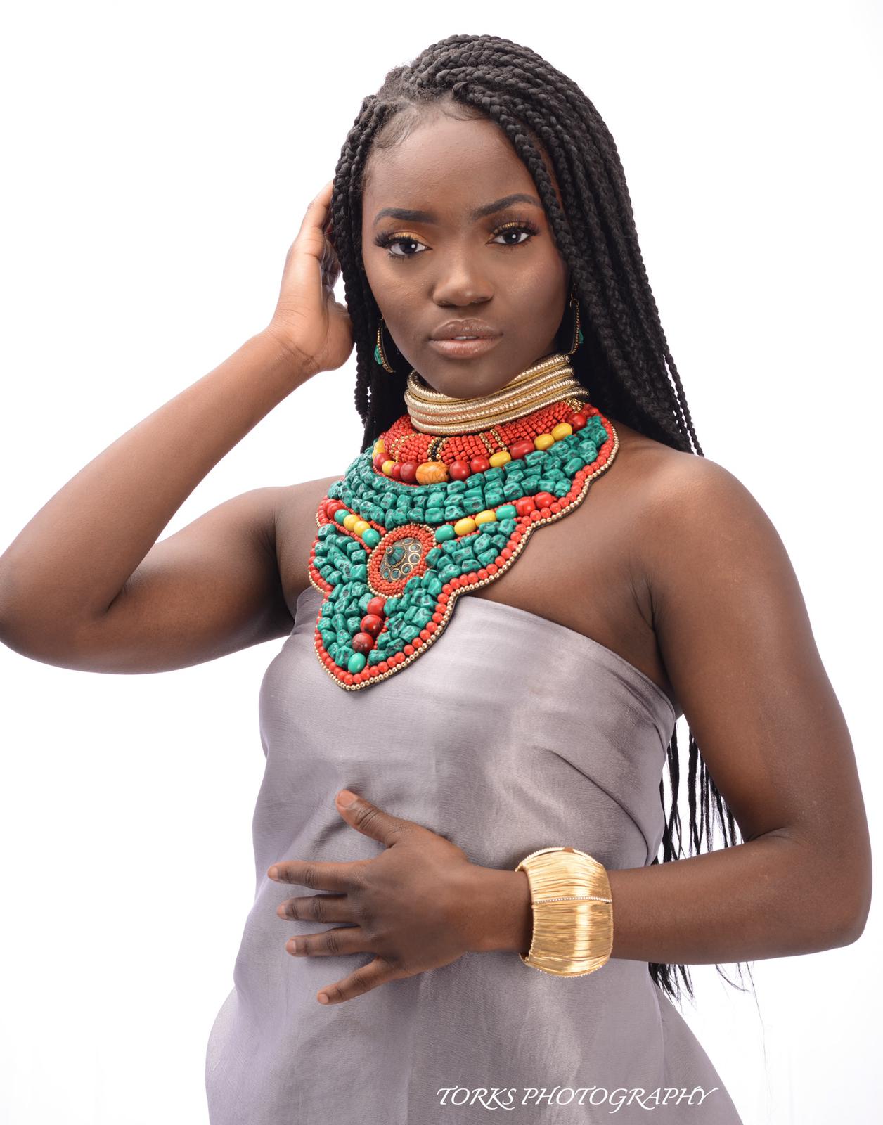black model with turquoise collar necklace