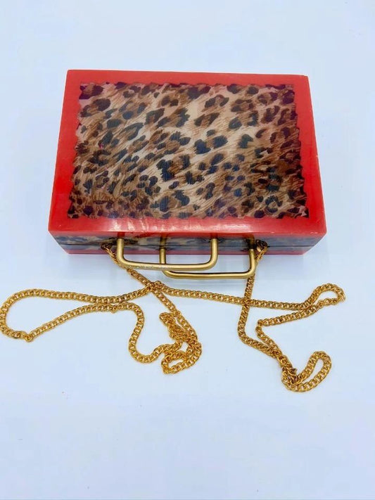 red acrylic leopard trimming box - side