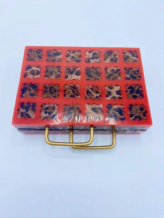 Handcrafted Resin Clutch With Metal Grab Handle.