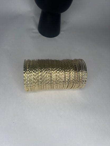 Queen JoJo D. Long Wire Spring Cuff Bracelet