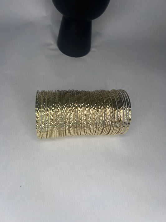 Queen JoJo D. Long Wire Spring Cuff Bracelet