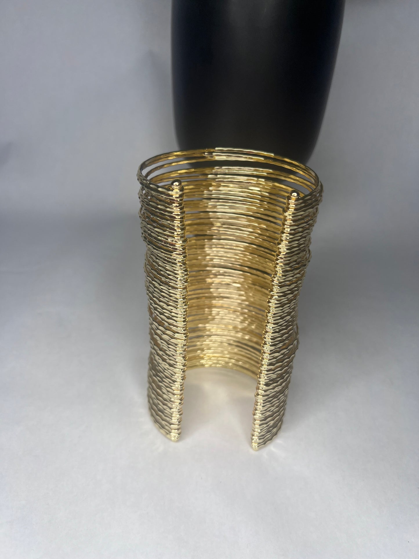 Queen JoJo D. Long Wire Spring Cuff Bracelet