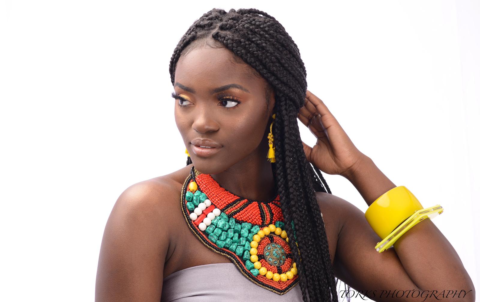 african girl with turquoise collar necklace and earrings