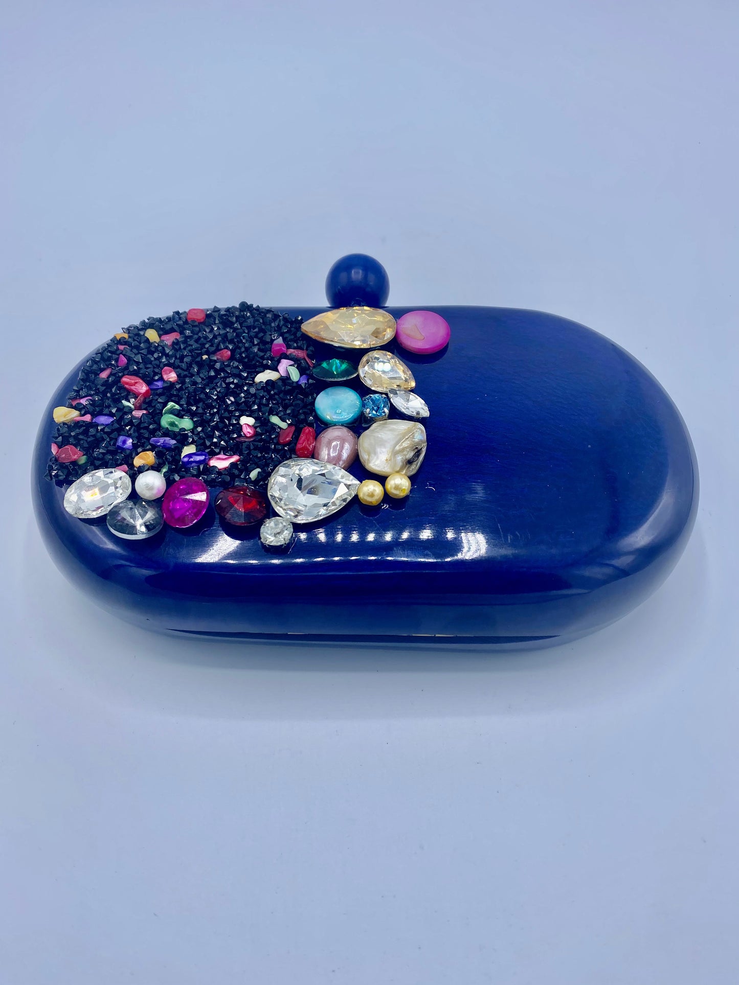 Handcrafted Oval Resin with embellishment of pearls and stones Clutch